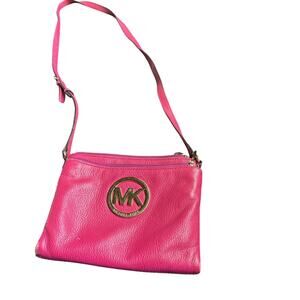 Michael Kors hot pink Crossbody with gold accents purse
